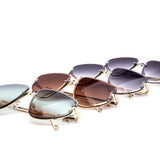 12 Pack: Royal Rimless Floral Accent Teardrop Wholesale Sunglasses